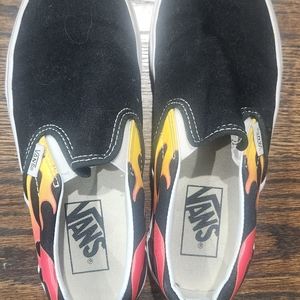 Vans slip on fire shoes black and orange size  US Women 6 /Men 4.5